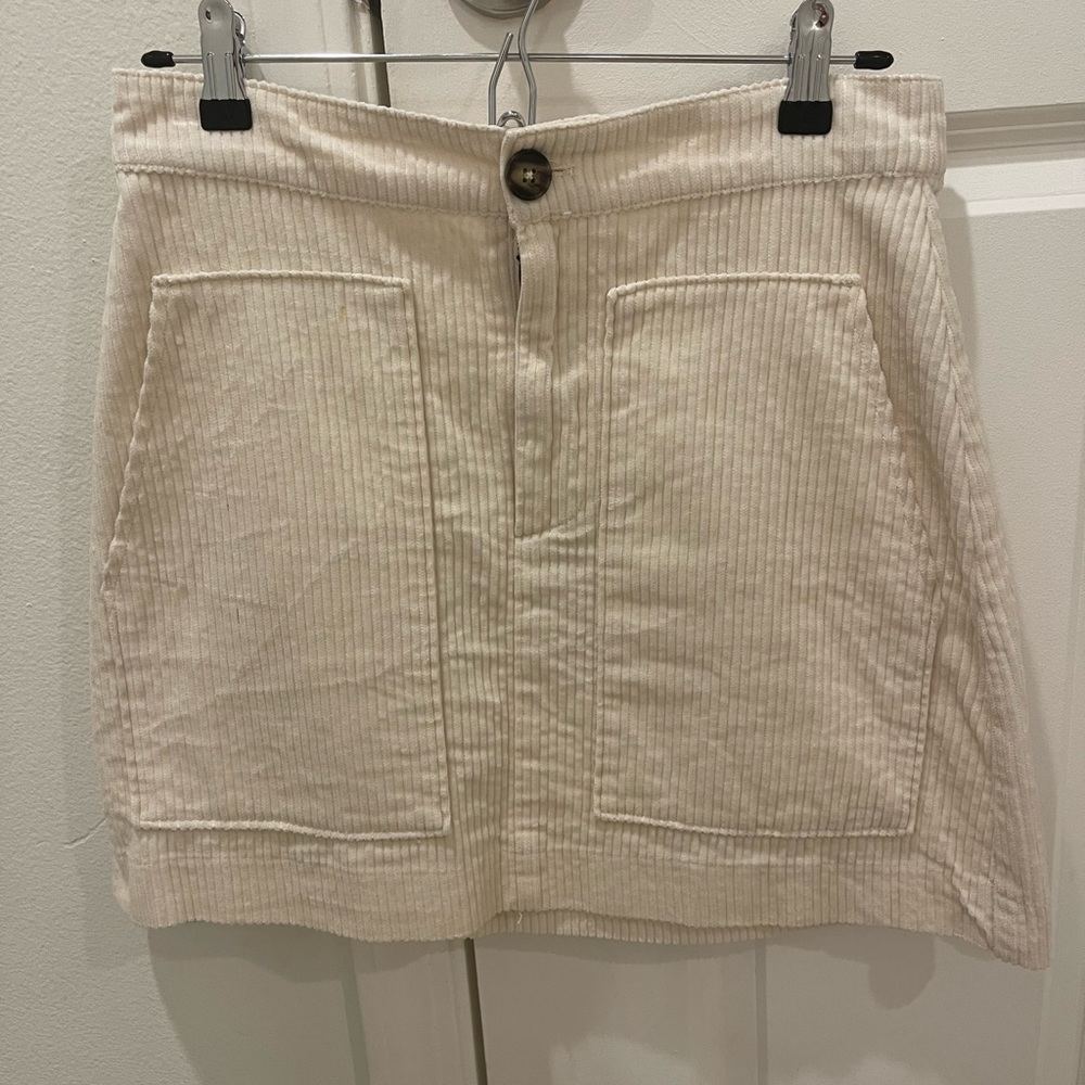 Off-white corduroy mini skirt